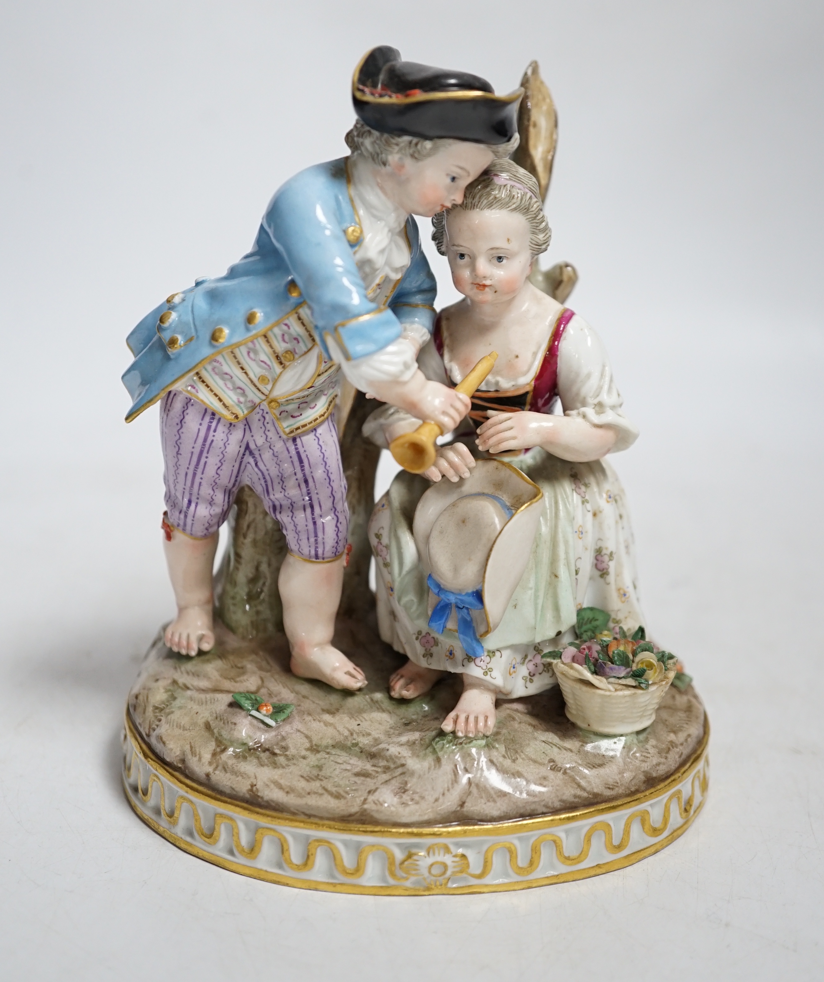A Meissen group of a boy and a girl with a piccolo, 19th century